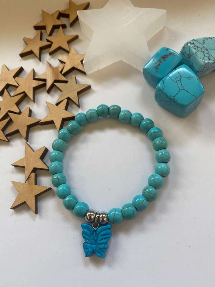 pulsera-turquesa-con-mariposa-y-acero